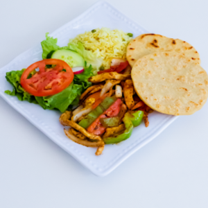 Fajitas, grilled meat with peppers and onions